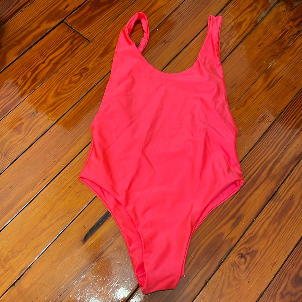 Brazilian one piece swimsuit in flashy pink